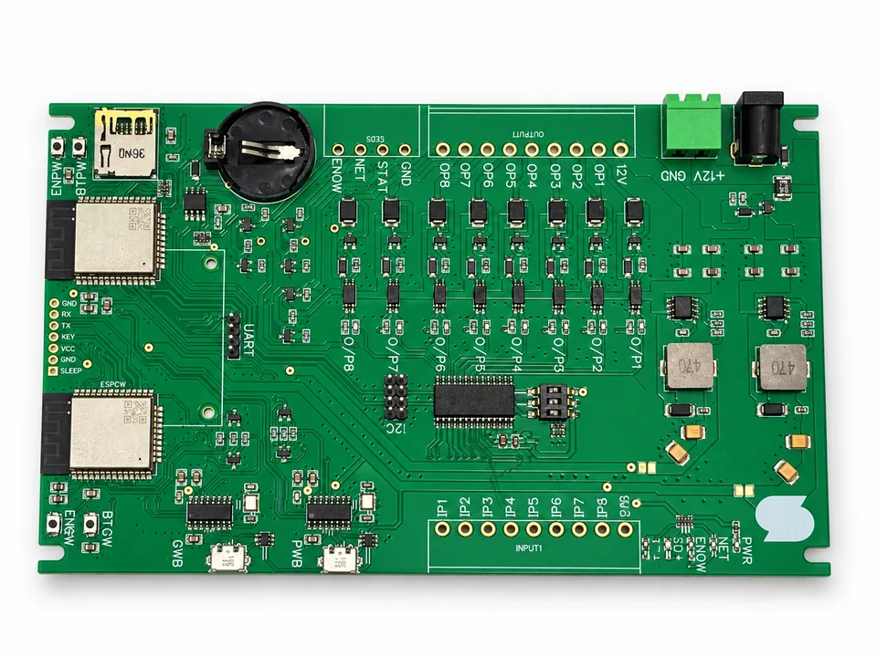 Green eight-channel I/O controller PCB with two wireless modules, input and output pads, USB connectors and battery holder